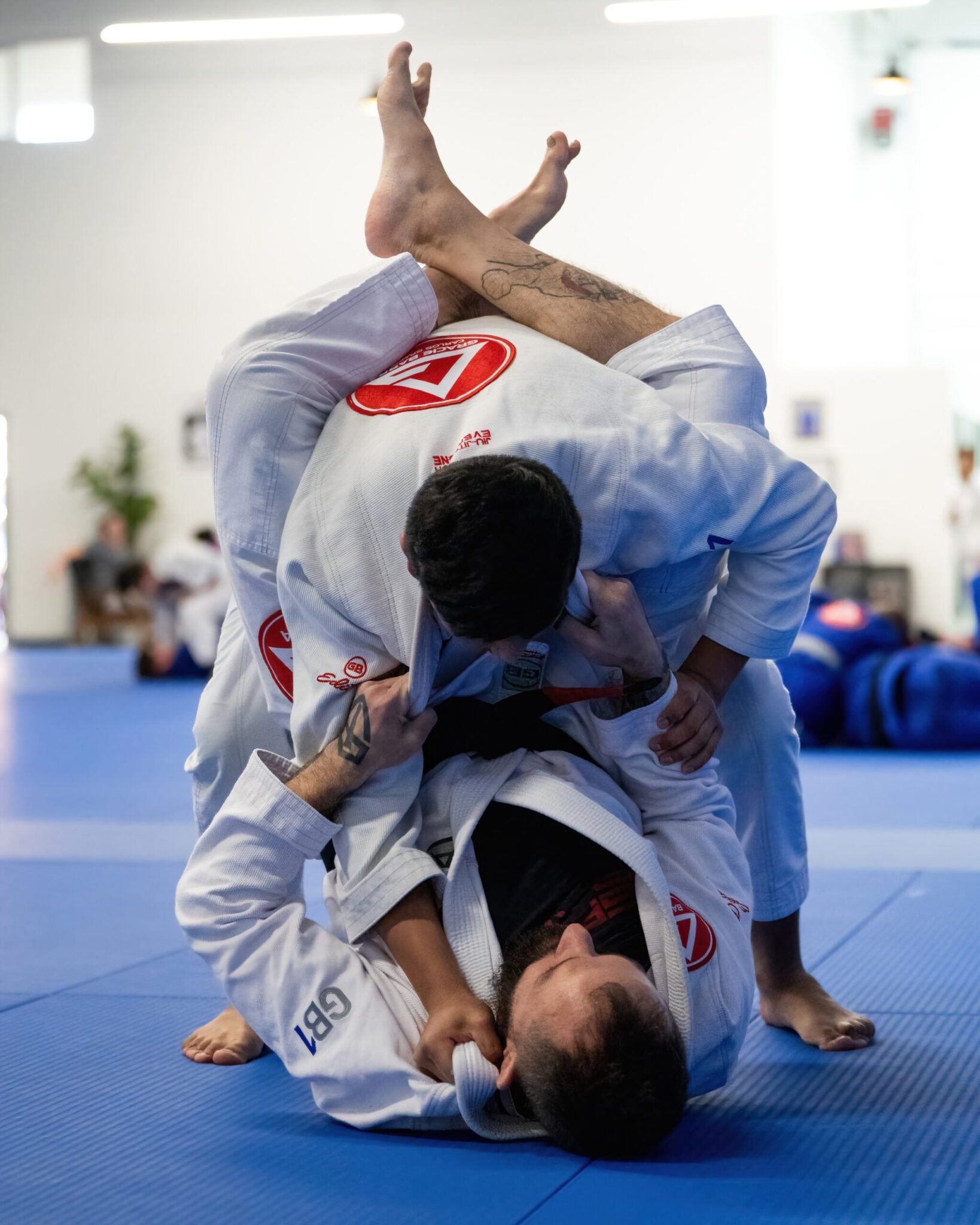 Students practicing BJJ at Gracie Barra West Jordan