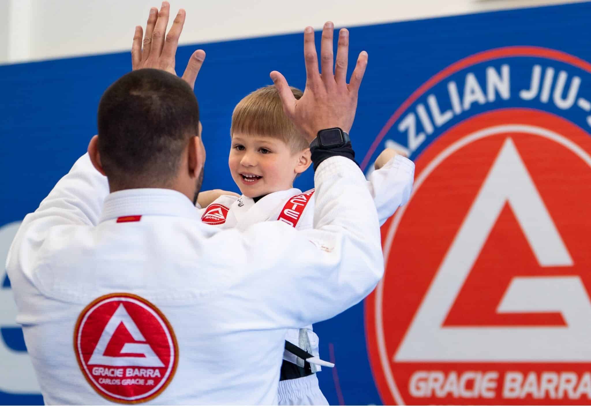 happy-child-doing-brazilian-jiu-jitsu-scaled