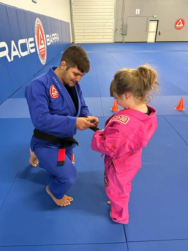 professor daniel graduating a little bjj student at gracie barra west jordan