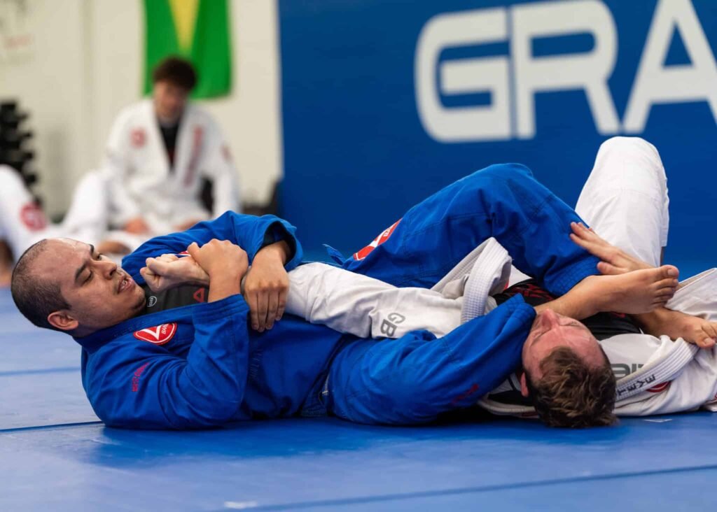 two adults students on the mat at Gracie Barra Riverton 2